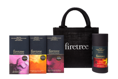 Firetree chocolate bars and a black tote bag on a transparent background